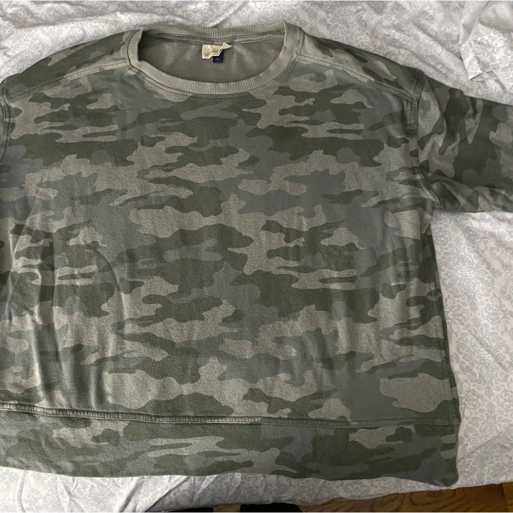 Adorable, camo crewneck. Short on length, but not cropped. Very flattering.